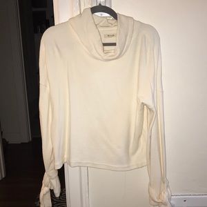 Ivory sweater with bell sleeves